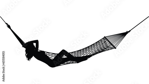 young woman relaxing in hammock silhouette