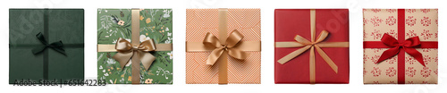 Gifts wrapped in pattern paper, decorated with atlas ribbon with bow on a transparent background. Christmas and New Year holidays.
