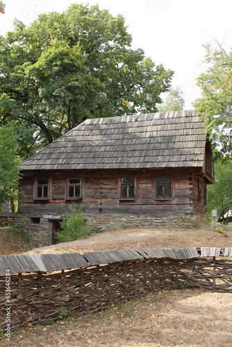 A log house with a roof