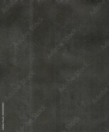 A high-quality scan of old black album paper that could be used as a texture or background. (ID: 651650063)