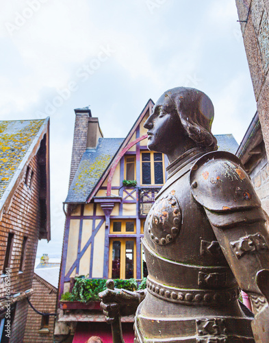 Fototapeta Naklejka Na Ścianę i Meble -  statue of Joan of Arc warrior and saint in the fortified village of Mont Saint Michel