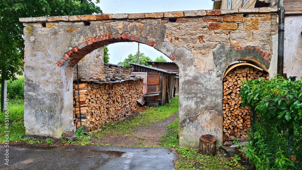 Stacked chopped wood is prepared for the stove in the village for the winter Stacked chopped wood is prepared for the stove in the village for the winter
