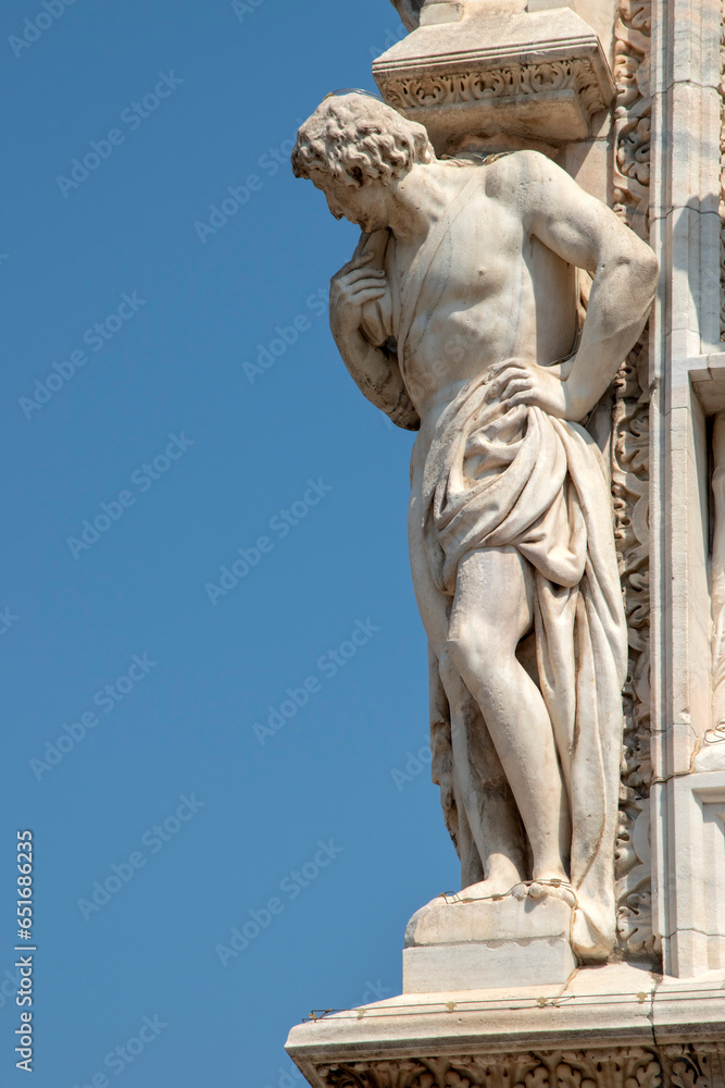 Detail of the Milan Cathedral, ancient cathedral church in the center of Milan, Italy, Europe
