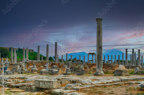 Doric columns at dusk on  collonaded street  of Perge