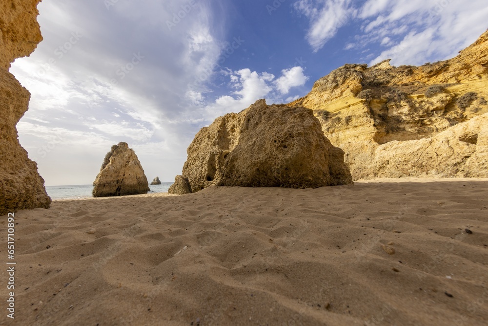 Panoramic picture between the cliffs at Praia do Prainha on the Portuguese Algarve coast during the day