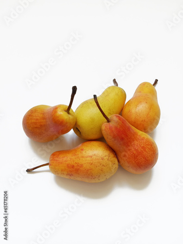 yellow-orange pears on a white background