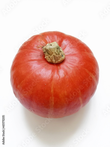 round orange pumpkin on white background