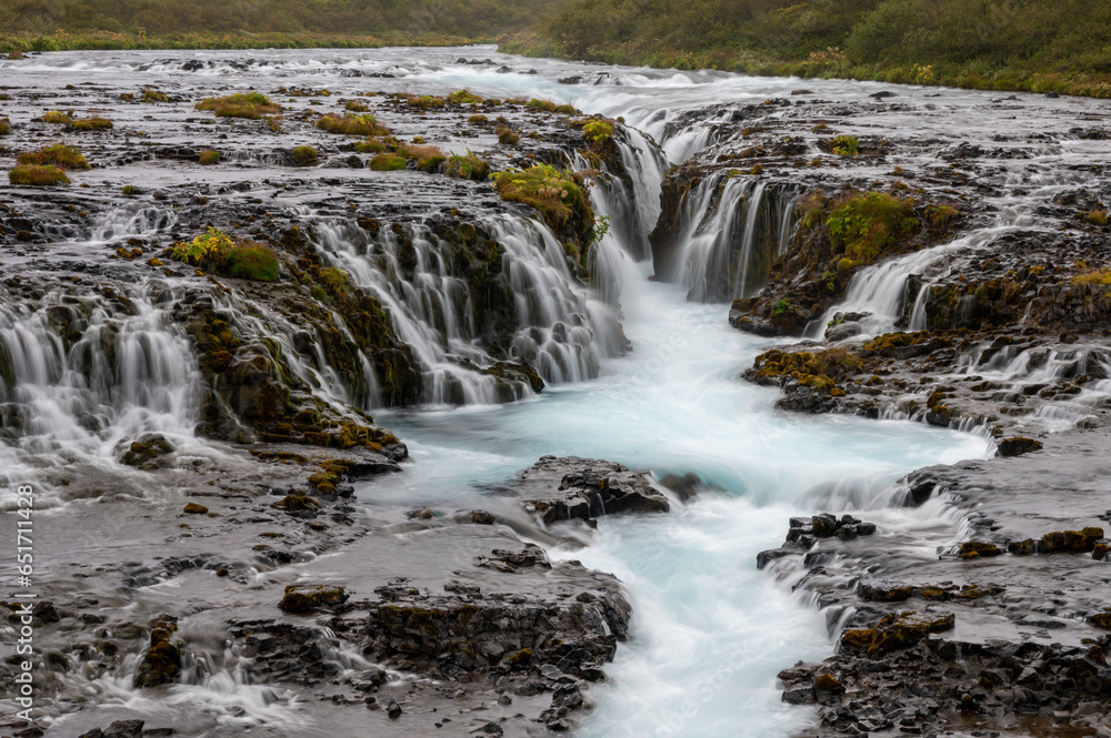 Bruarfoss - Bridge Falls - on Iceland's Golden Circle route under cloudy autumn sky. Bruarfoss - Bridge Falls - on Iceland's Golden Circle route under cloudy autumn sky.