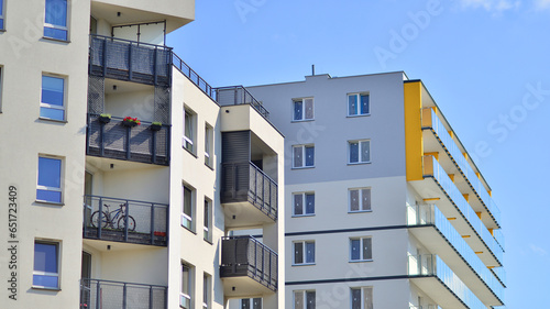 Modern luxury residential building. Modern apartment building on a sunny day. Facade apartment building with a blue sky. 