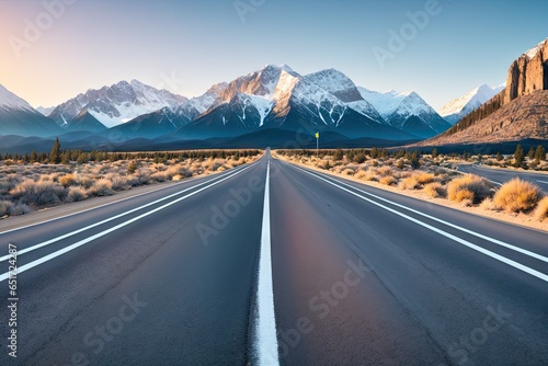A long straight road leading towards a snow capped mountain, generative ai image © Aleksandr