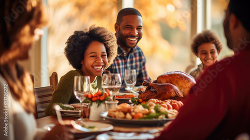 Happy Family celebrating Thanksgiving at the table