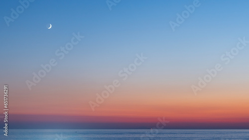 sunset over the sea © izzetugutmen