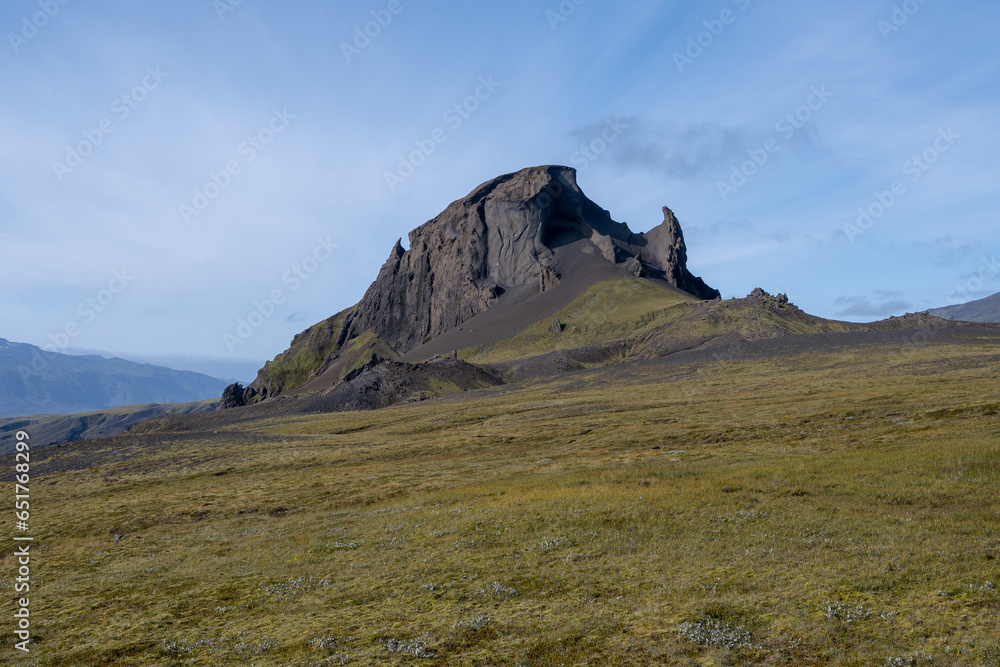 Einhyrningur - Unicorn - Mountain in Fjallabak Nature Reserve, Iceland under sunny autumn cloudscape.