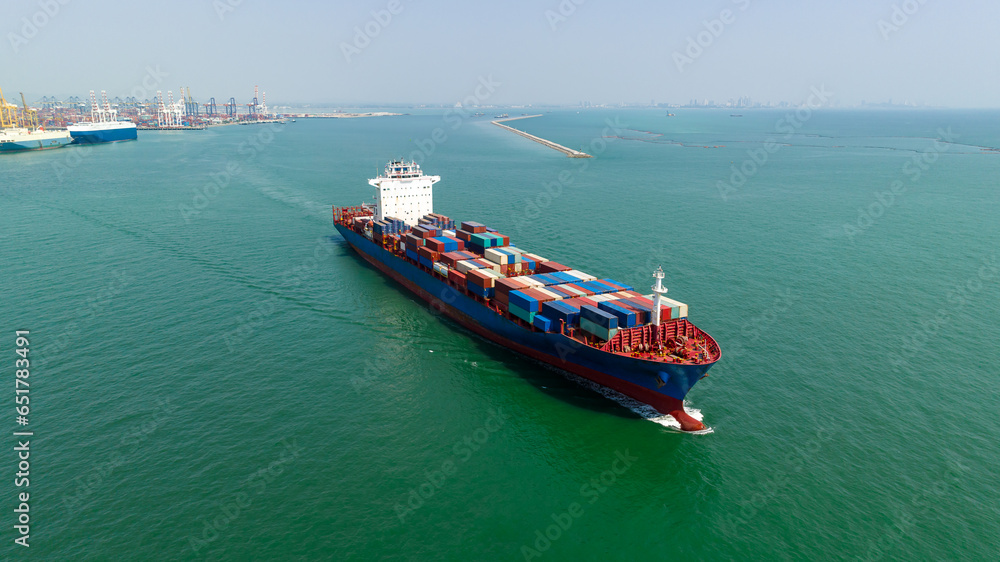 cargo container ship carrying in sea import export goods and distributing products to dealer consumers across Asia pacific and worldwide global business transportation by container ship open sea