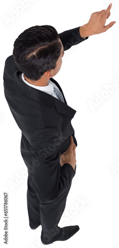 Digital png photo of biracial businessman pointing on transparent background