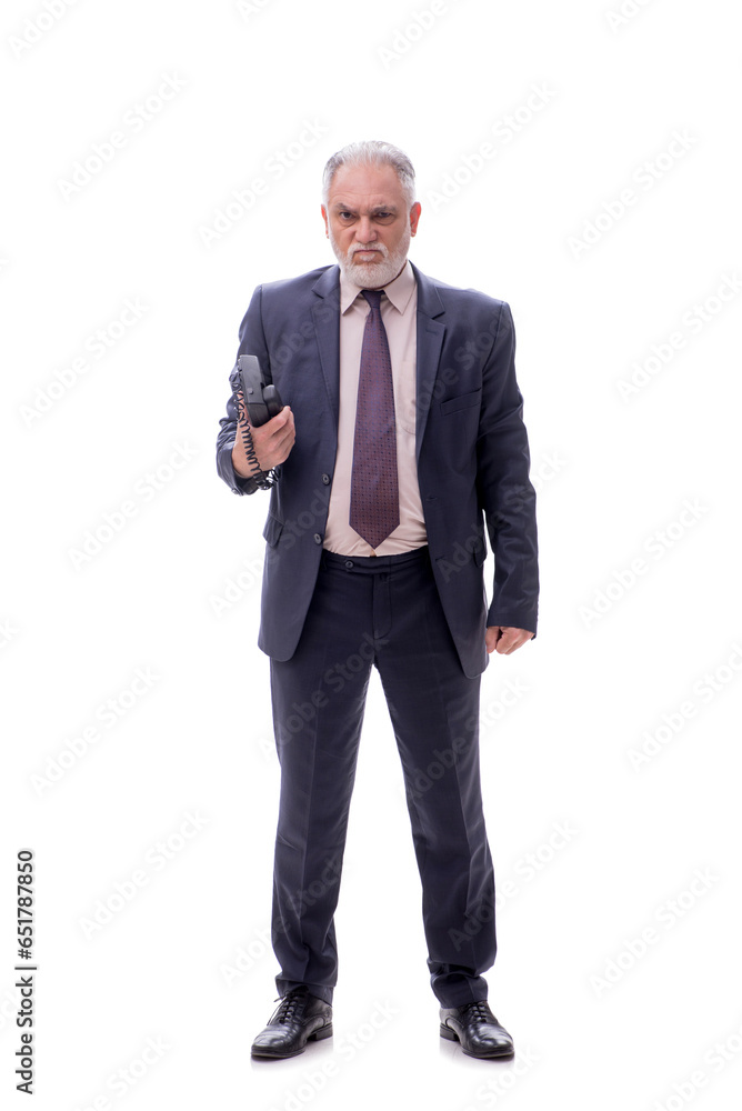 Old businessman talking by phone isolated on white Old businessman talking by phone isolated on white