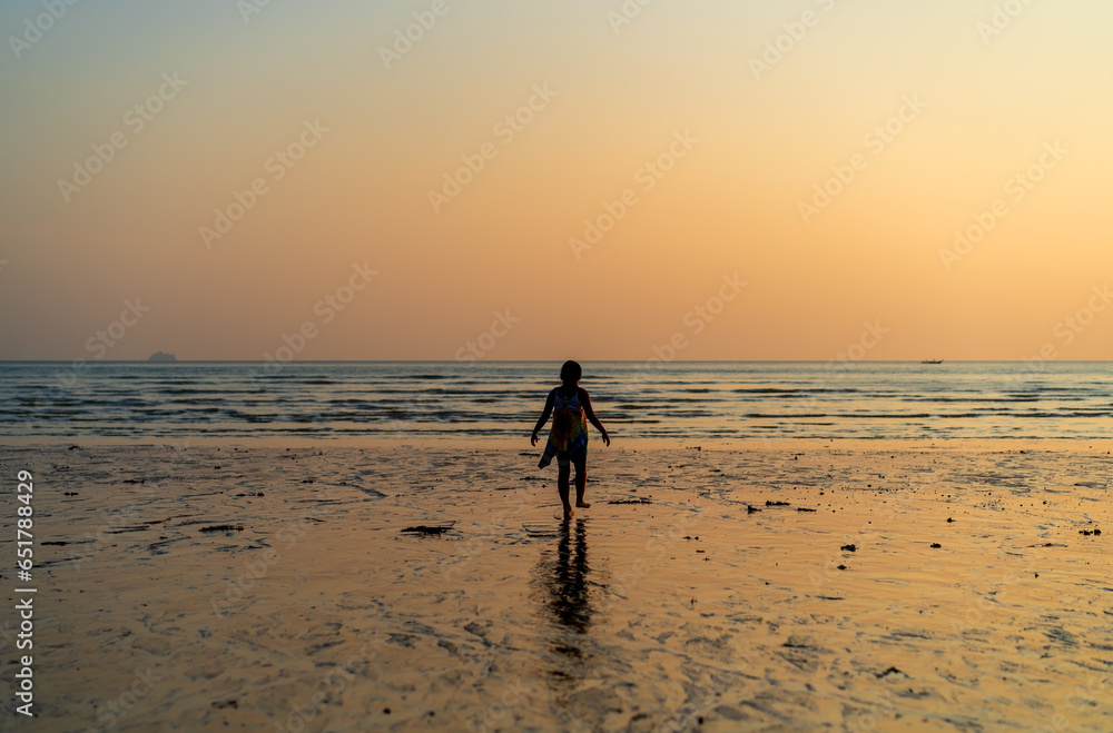back asian child travel or kid girl walking on sea beach in summer island and people relax with golden sunlight on sunset or morning sunrise to mountain and tourist fishing boat for holiday vacation back asian child travel or kid girl walking on sea beach in summer island and people relax with golden sunlight on sunset or morning sunrise to mountain and tourist fishing boat for holiday vacation