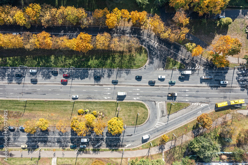 busy highway road intersection with car traffic. aerial overhead view.