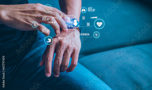 Mid adult man using smart watch during training. Heart monitor beats with wristwatch. smart watch or future data on healthcare. technology in use of smart watch for health condition.