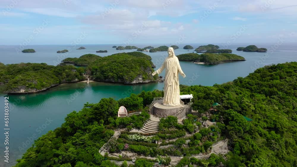 Aerial view of the hundred Islands national Park and the statue of ...