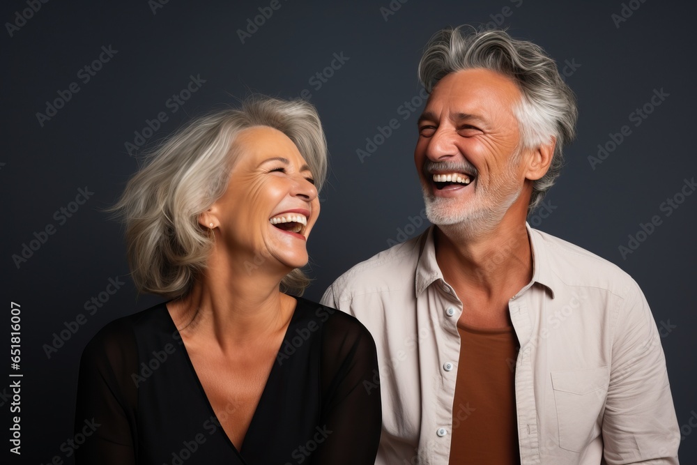 Beautiful middle-aged senior model in her fifties with gray hair laughing and smiling. Old man and elderly woman close up image. Facial health care. beauty care Skin care cosmetics, dentistry Beautiful middle-aged senior model in her fifties with gray hair laughing and smiling. Old man and elderly woman close up image. Facial health care. beauty care Skin care cosmetics, dentistry