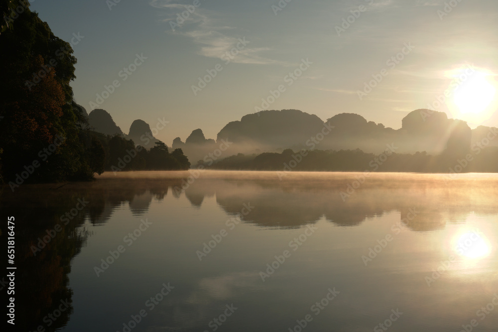 Landscape Nature View of Nong Thale Lake in Krabi Thailand -beautiful limestone mountain with reflection on the lake Morning Sunrise view. Unseen In Krabi 