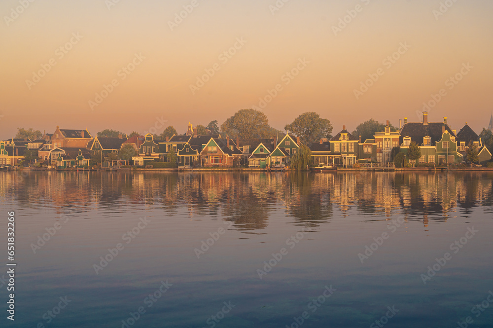 Zaandijk, Netherlands. Panorama of traditional dutch houses at the Zaan river in Zaandijk, Netherlands.

