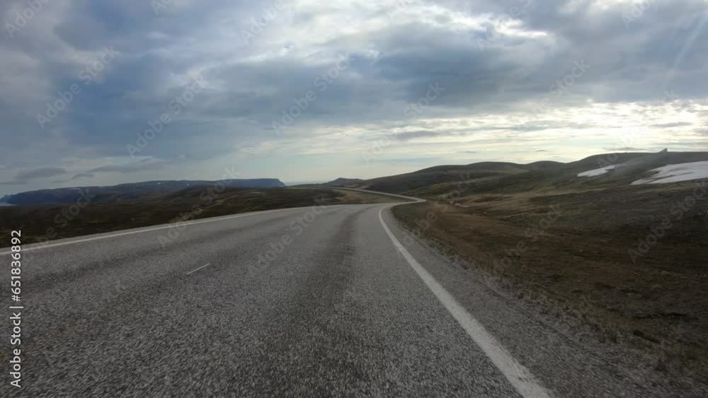 Point of view of driving through tundra landscape in Nordkapp Norway. Action camera POV footage. Point of view of driving through tundra landscape in Nordkapp Norway. Action camera POV footage.