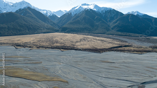 Aerial photography of the braided river with very little water flowing through the alpine Arthurs Pass