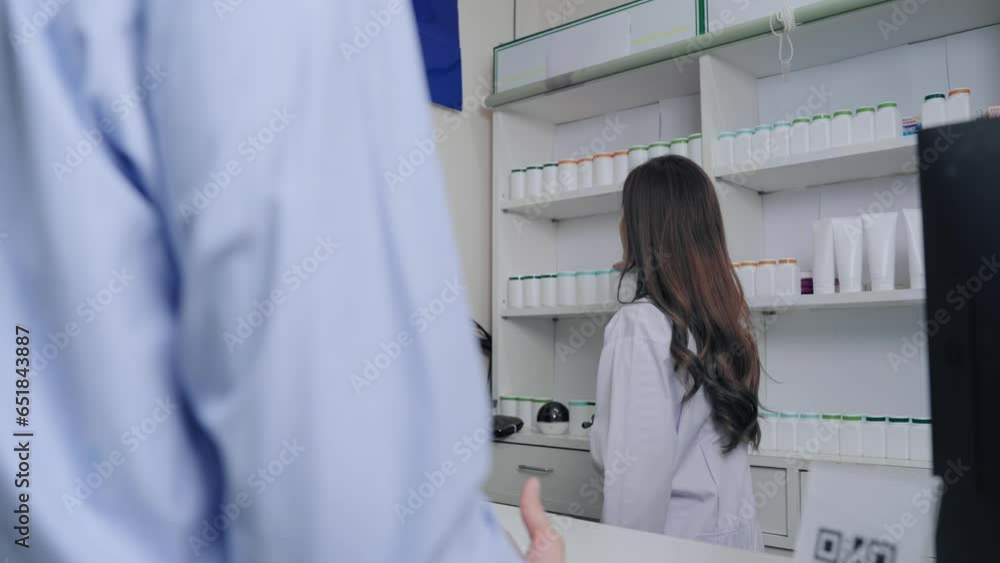Professional asian female pharmacist advice to customer man at drugstore. Asian customer man feeling sick want to buy medicine with doctor female at pharmacy. Professional asian female pharmacist advice to customer man at drugstore. Asian customer man feeling sick want to buy medicine with doctor female at pharmacy.