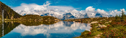 High resolution stitched alpine summer panorama with reflections at Lake Klaussee, Mount Klausberg, Ahrntal valley, Pustertal, Trentino, Bozen, South Tyrol