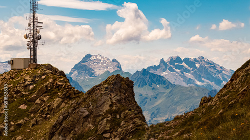 Alpine summer view with a huge radio antenna at Mount Kreuzjoch, Schruns, Bludenz, Montafon, Vorarlberg, Austria photo