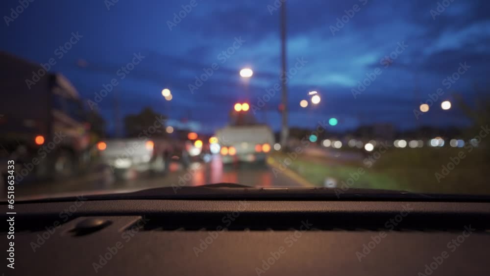 Video taken from inside a car on a rainy day, wandering the streets at night with beautiful lights and bokeh. Video taken from inside a car on a rainy day, wandering the streets at night with beautiful lights and bokeh.