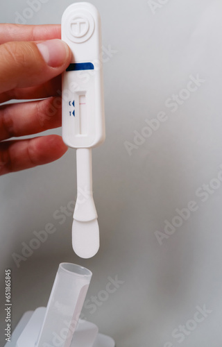 rapid HIV test. hiv test isolated on gray background