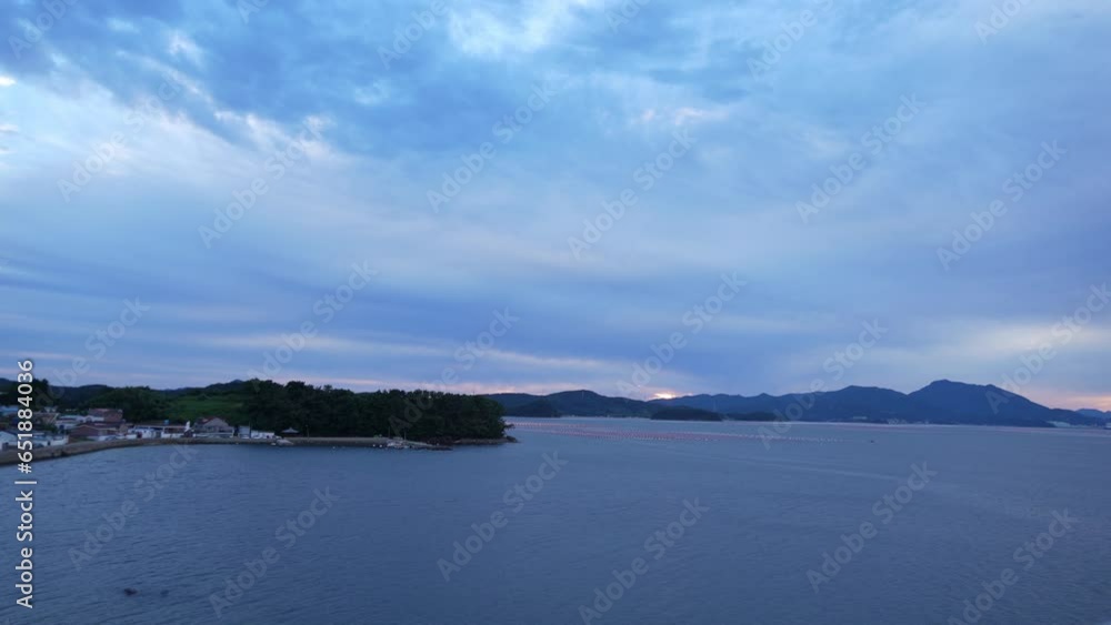 Time lapse of sky mountain river and cloud landscape. The clouds are dramatic over the evening twilight on the sky Time lapse of sky mountain river and cloud landscape. The clouds are dramatic over the evening twilight on the sky