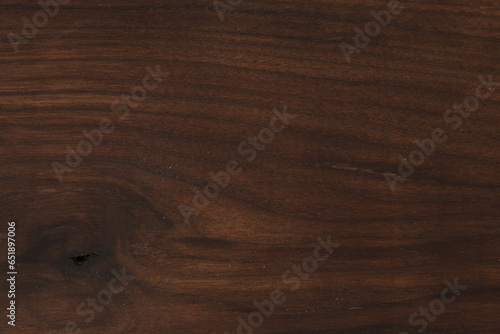 Used black walnut wood board texture with oil finish closeup