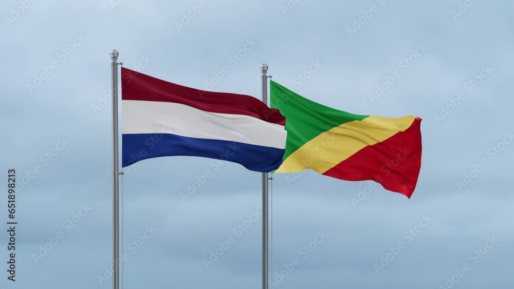 Republic of the Congo flag and Netherlands flag waving together on cloudy sky, endless seamless loop, two country relations concept Republic of the Congo flag and Netherlands flag waving together on cloudy sky, endless seamless loop, two country relations concept