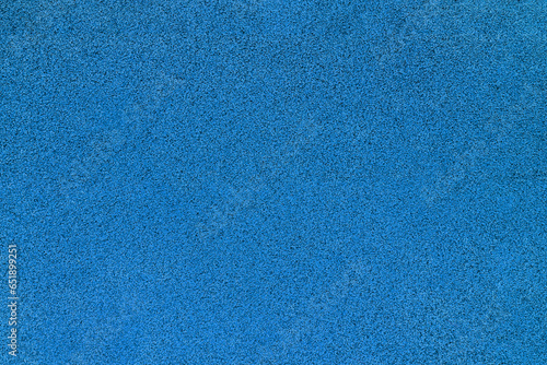 Grainy blue texture made of rubber tiles