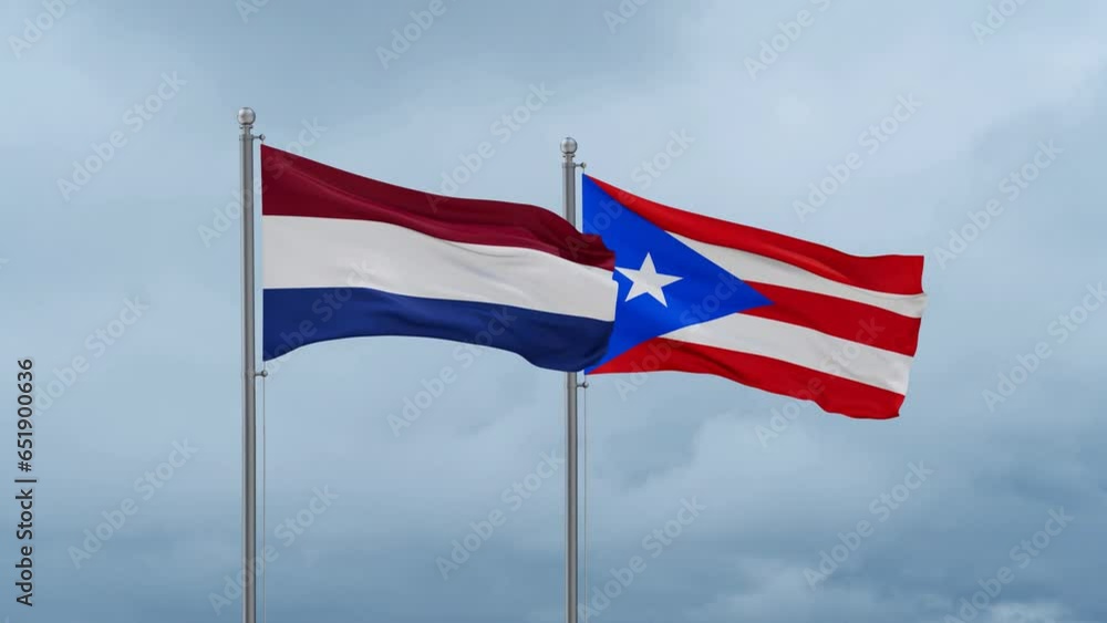 Puerto Rico and Netherlands flag waving together on cloudy sky, endless seamless loop, two country cooperation concept Puerto Rico and Netherlands flag waving together on cloudy sky, endless seamless loop, two country cooperation concept