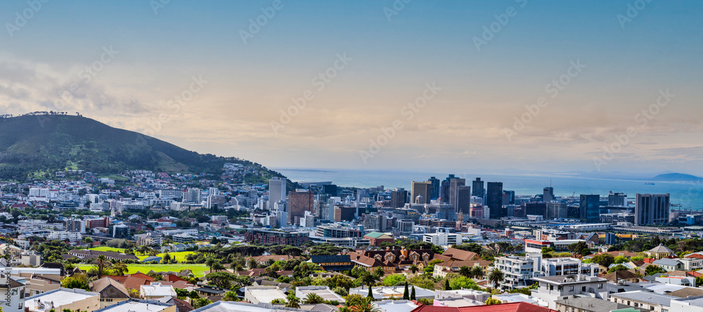 Panorama shot of Cape Town city centre and signal hill with atlantic ocean in the background during sunset, Cape Town, South Africa