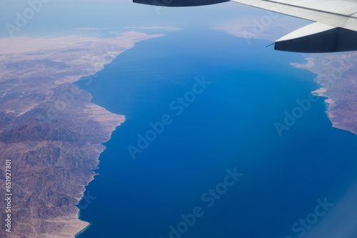 Scenic aerial view of the Red Sea amidst a mountainous desert landscape