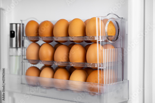Shelf for eggs. Eggs in the refrigerator
