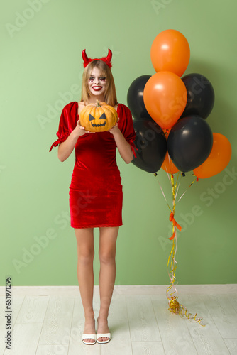 Young woman dressed for Hal...