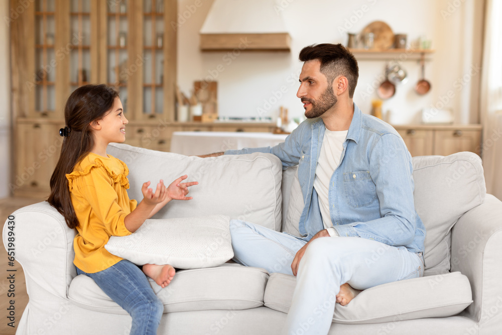 Daughter Smiling And Talking To Dad Bonding At Home Daughter Smiling And Talking To Dad Bonding At Home