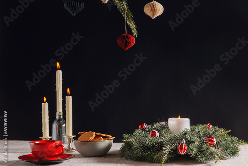 winter holidays and celebration concept - close up of christmas wreath, ginge...