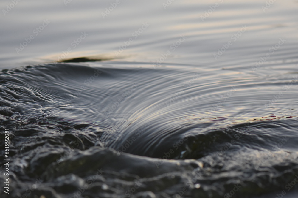water flowing into the water water flowing into the water