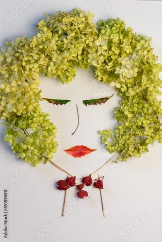 creative ideas with colorful autumnal leaves and flowers