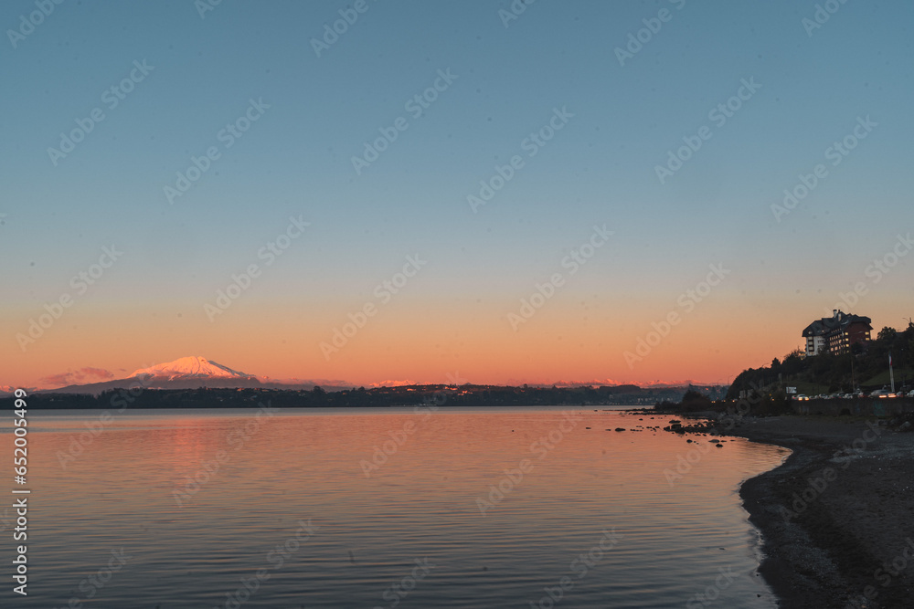 long exposure sunset over the lake at puerto varas in chile