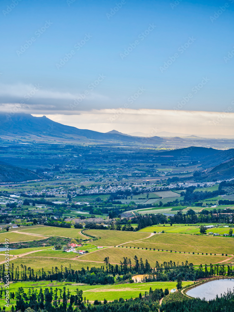 Aerial vertical shot of Franschhoek wine valley during sunset, Western Cape, South Africa