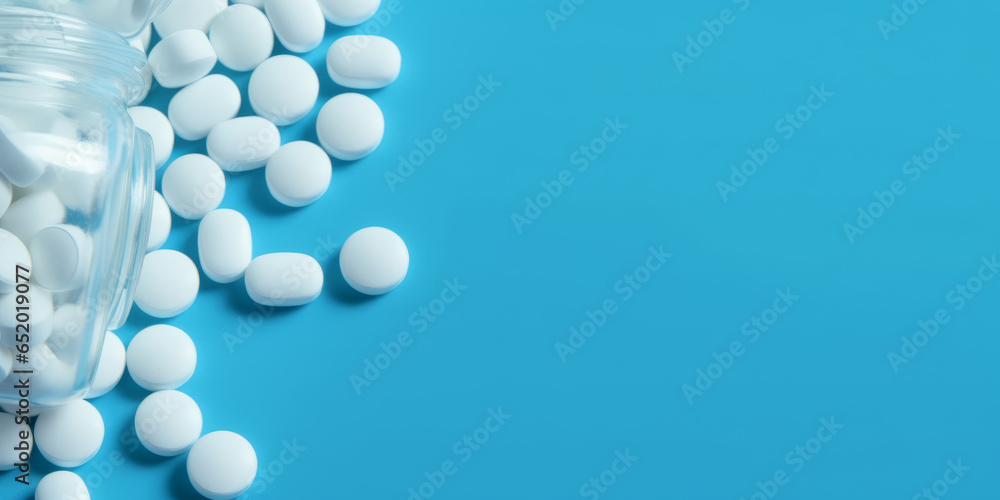 White pills from plastic medicine bottle on blue background.generative ai White pills from plastic medicine bottle on blue background.generative ai